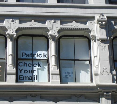 Funny Sign in Window Saying Check your email